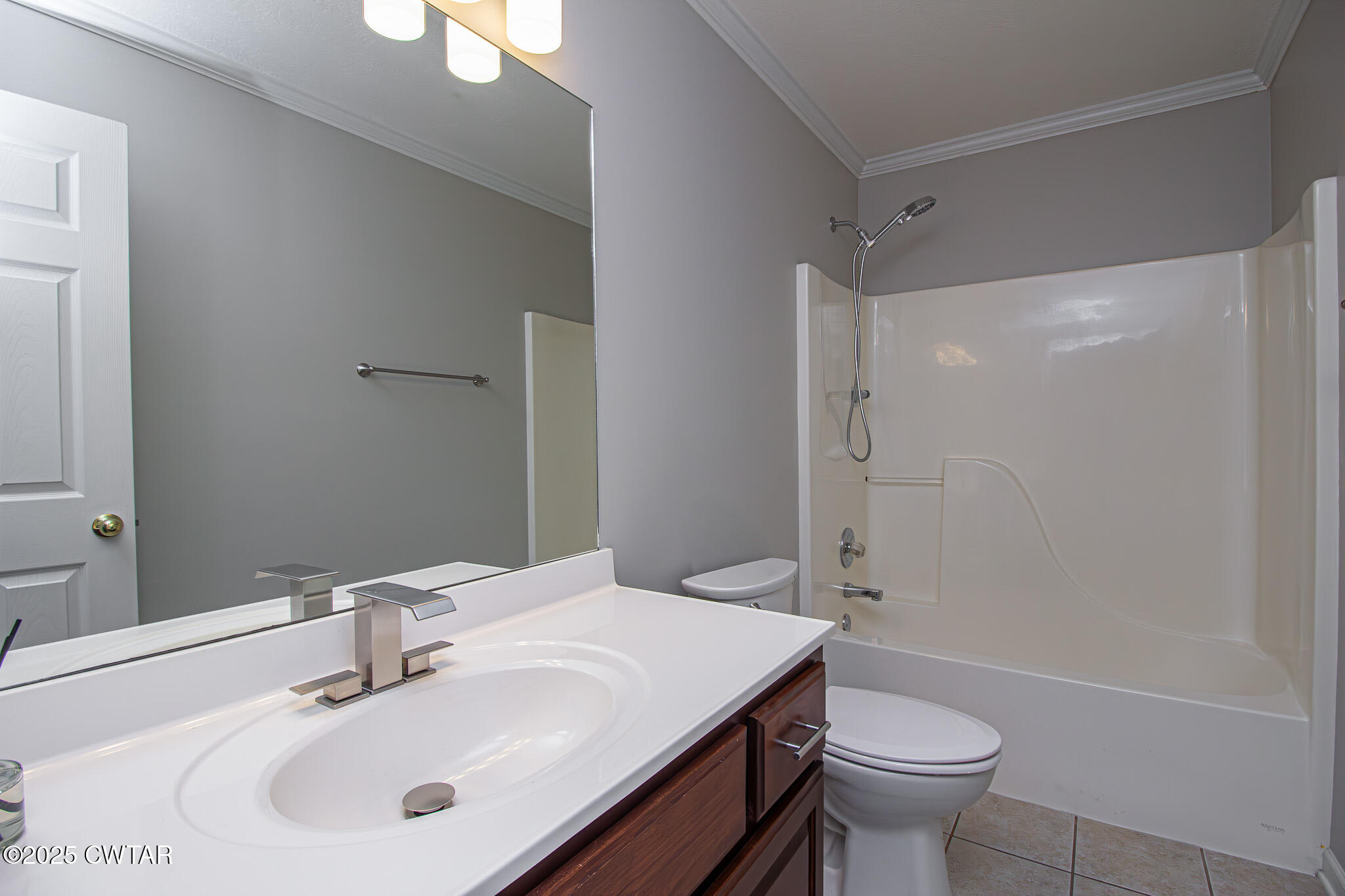 88 Rooker Drive Jackson, TN 38305 - Photo 15 of 20 a bathroom with a sink toilet and shower