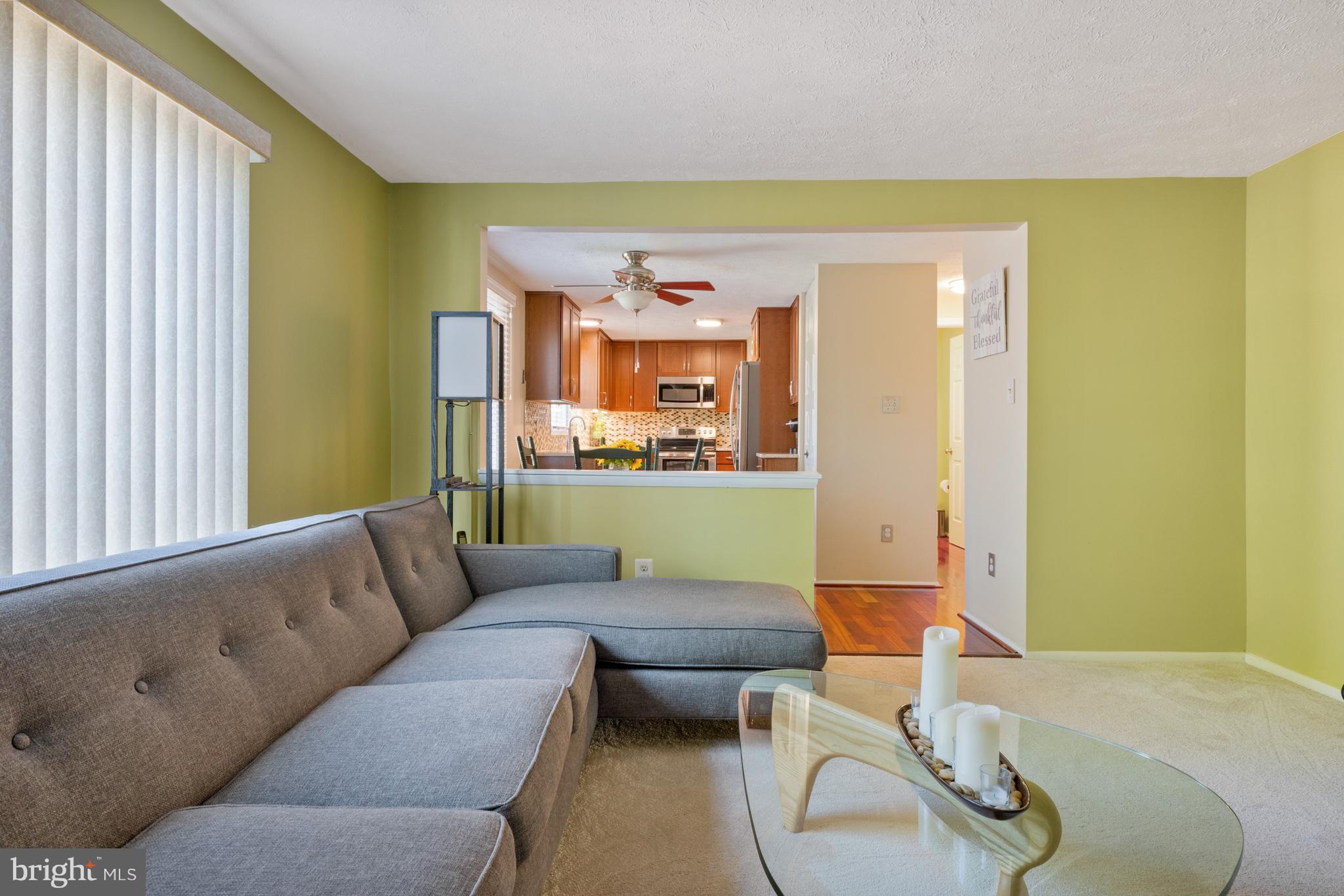 4401 Cub Run Road Chantilly, VA 20151 - Photo 23 of 60 a living room with furniture and a large window