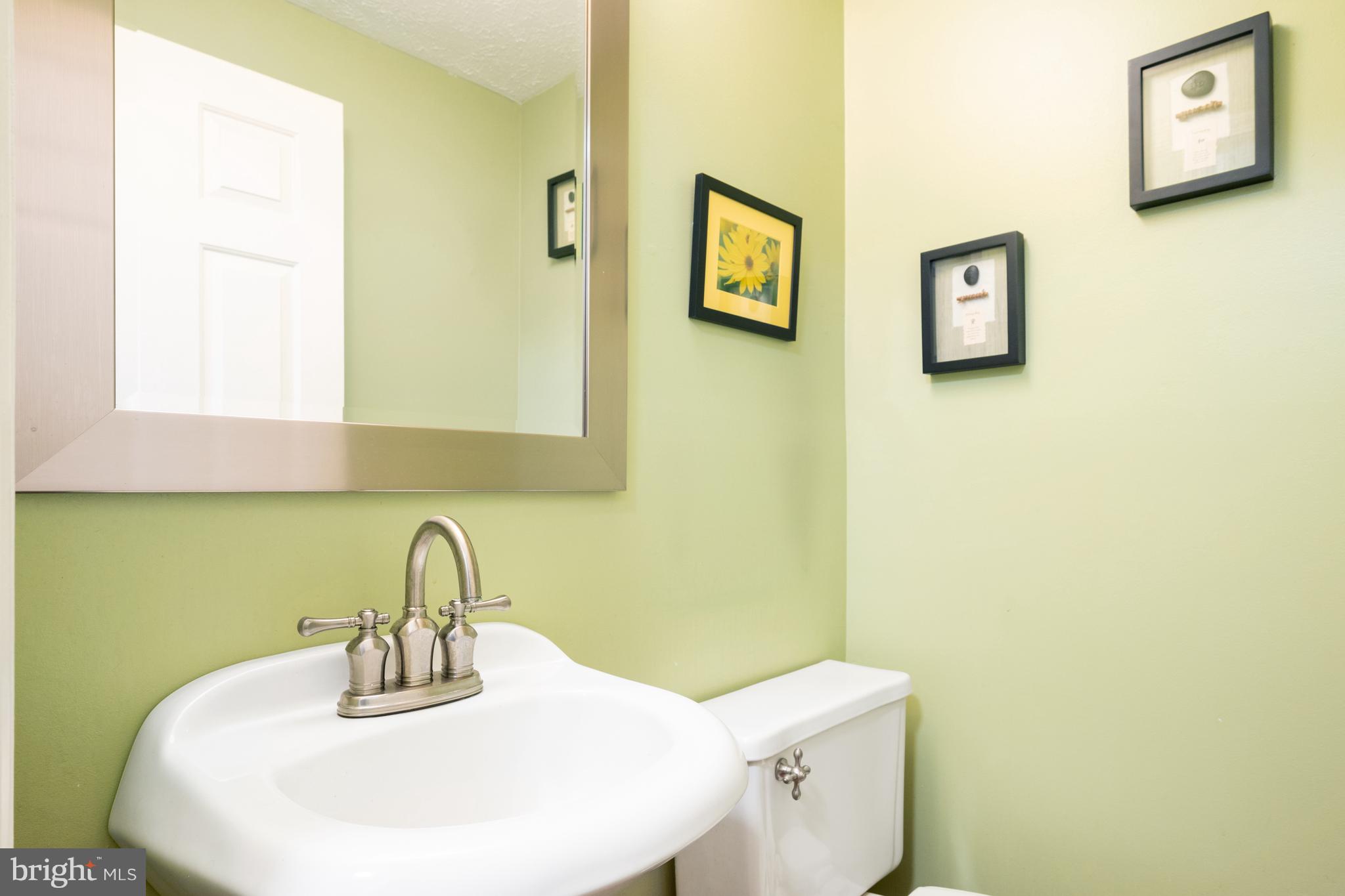 4401 Cub Run Road Chantilly, VA 20151 - Photo 26 of 60 a bathroom with a sink and a mirror