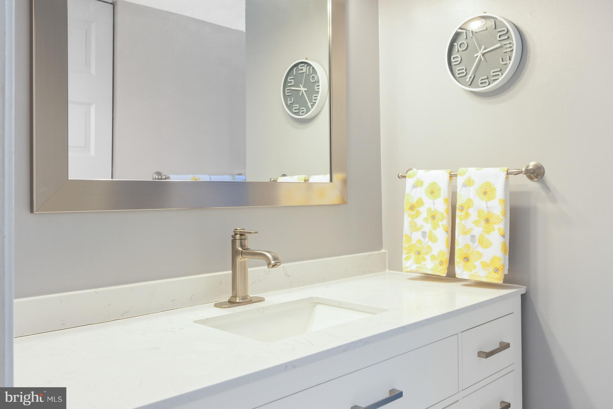 4401 Cub Run Road Chantilly, VA 20151 - Photo 34 of 60 a bathroom with a sink and a window