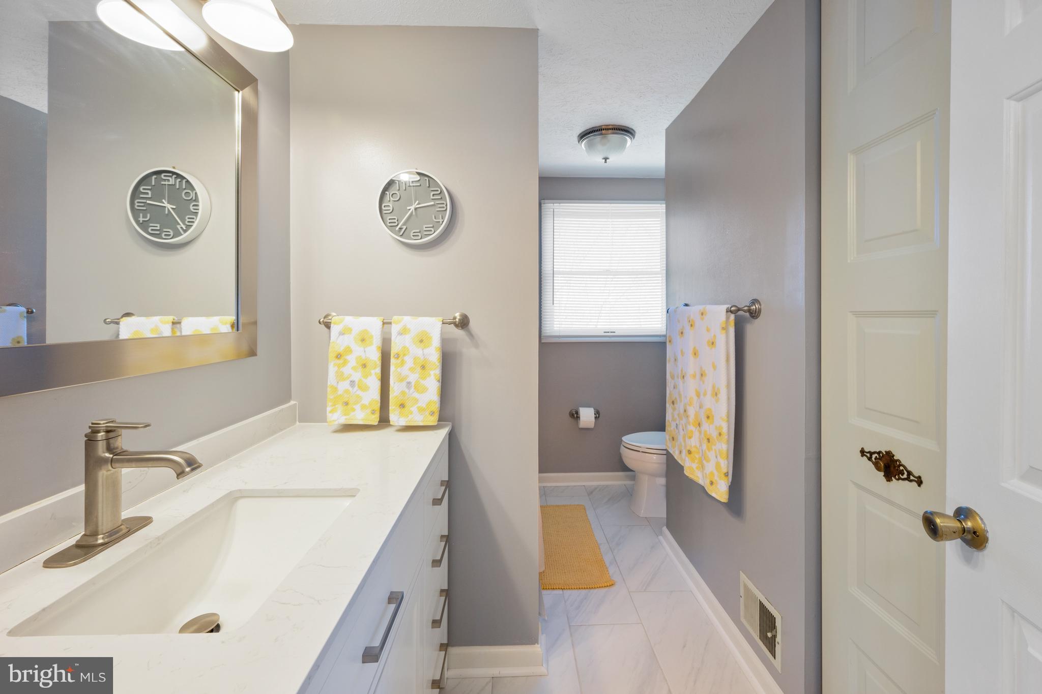 4401 Cub Run Road Chantilly, VA 20151 - Photo 35 of 60 a spacious bathroom with a tub sink and a mirror