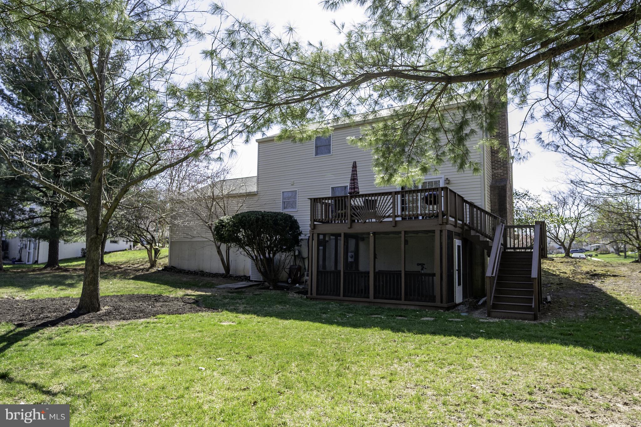 4401 Cub Run Road Chantilly, VA 20151 - Photo 7 of 60 a view of a house with a yard and tree