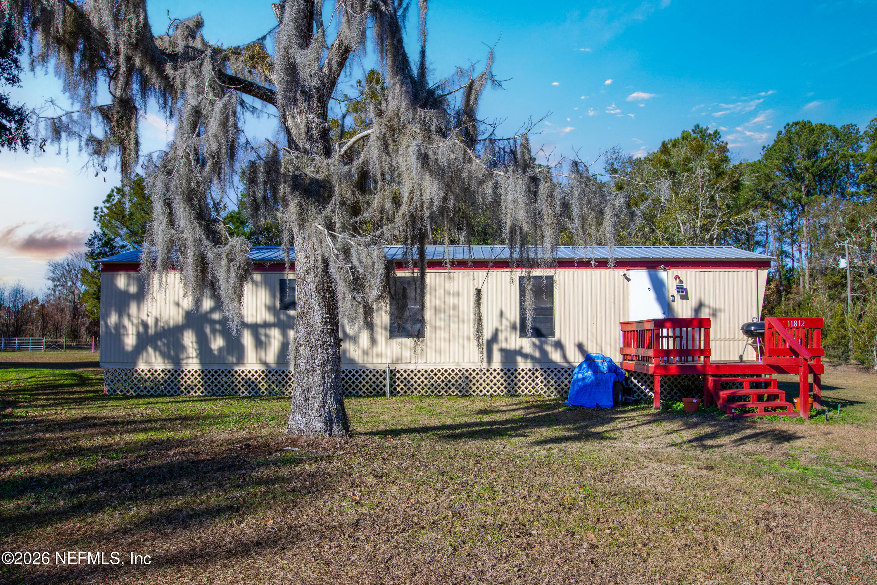 11830 Southwest 45th Terrace Lake Butler, FL 32054 - Photo 2 of 16 a view of outdoor space with seating area