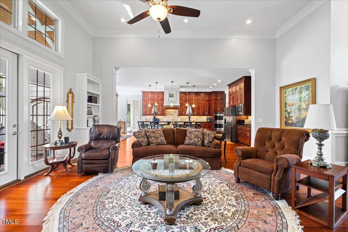 2304 Gresham Lake Road Raleigh, NC 27615 - Photo 12 of 55 a living room with furniture or couch and a dining table