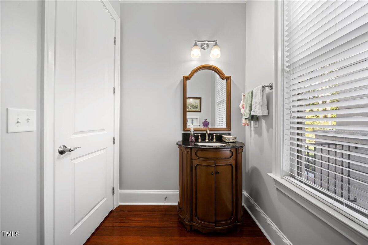 2304 Gresham Lake Road Raleigh, NC 27615 - Photo 25 of 55 a view of a livingroom with wooden floor and furniture