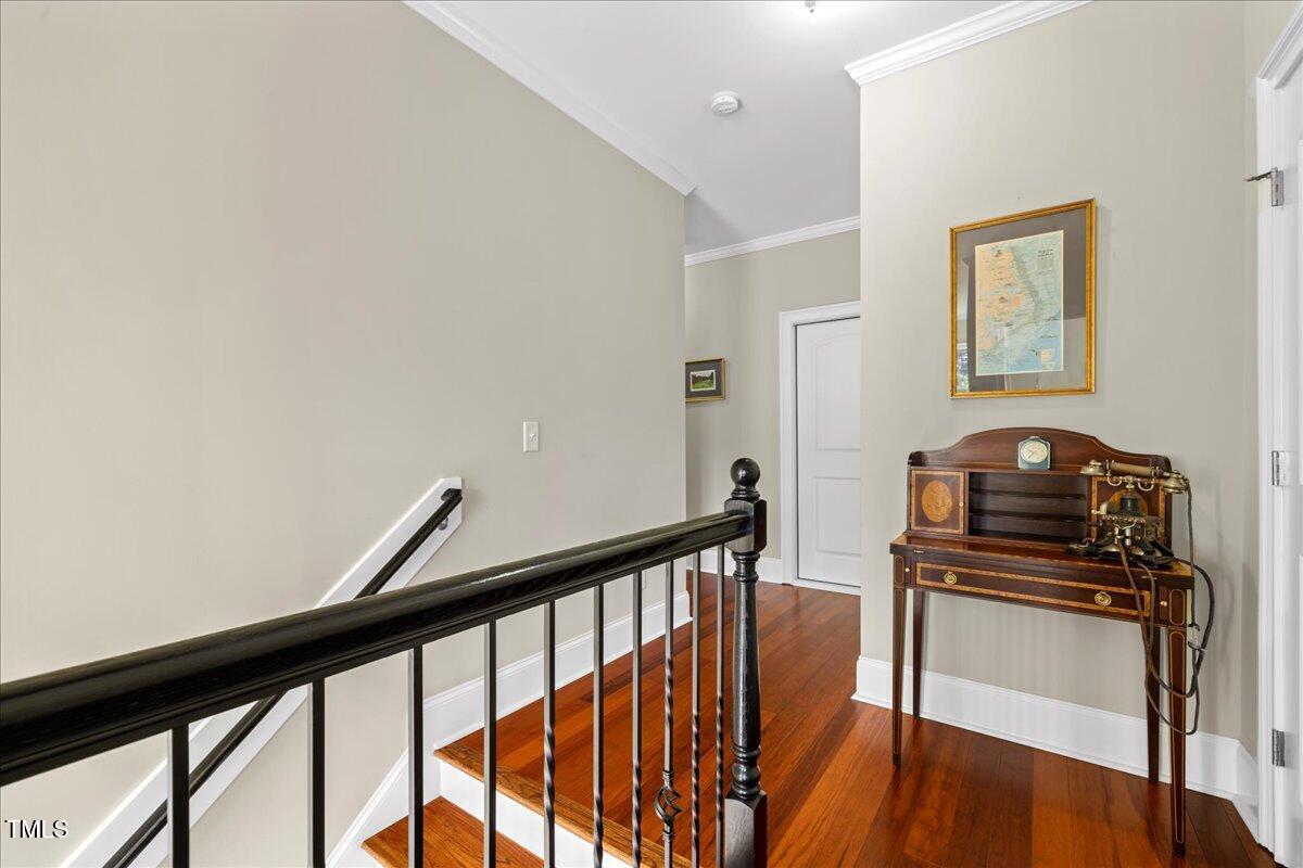 2304 Gresham Lake Road Raleigh, NC 27615 - Photo 36 of 55 a view of a hallway with workspace