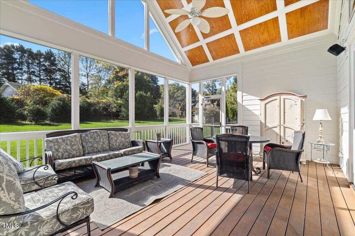 2304 Gresham Lake Road Raleigh, NC 27615 - Photo 48 of 55 a living room with furniture and a floor to ceiling window