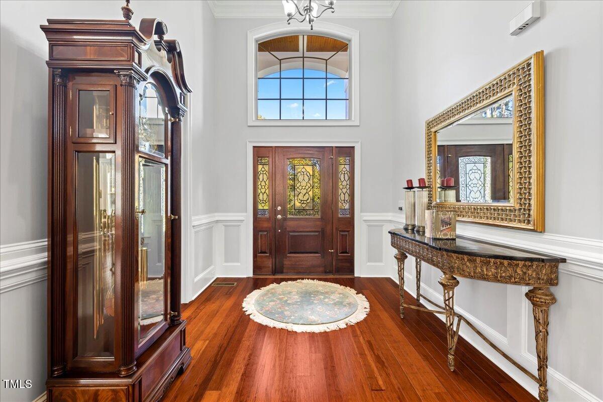 2304 Gresham Lake Road Raleigh, NC 27615 - Photo 5 of 55 a bathroom with a sink a mirror and a shower