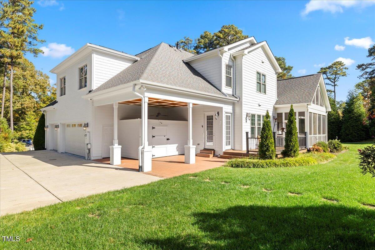 2304 Gresham Lake Road Raleigh, NC 27615 - Photo 52 of 55 a front view of a house with a yard