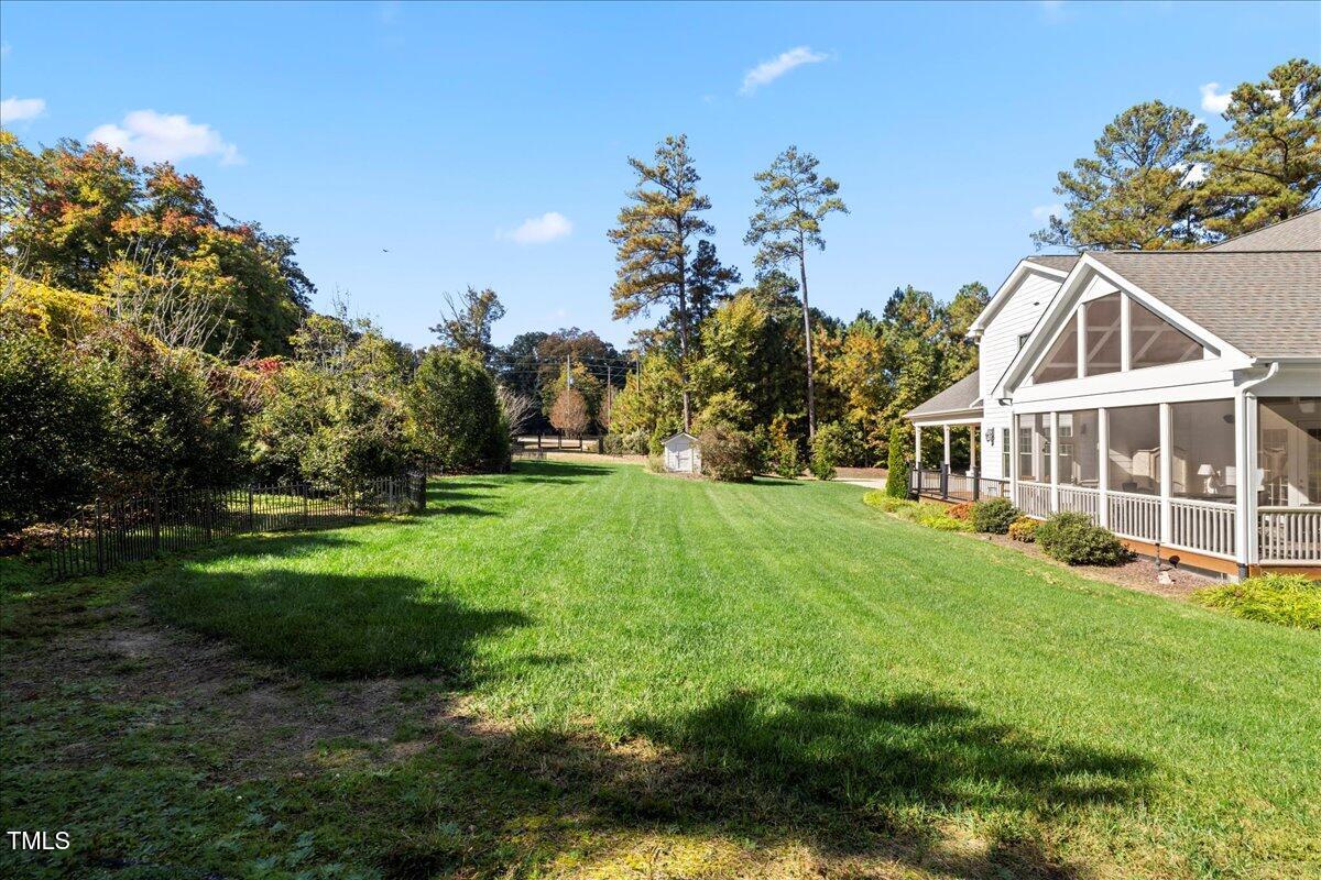 2304 Gresham Lake Road Raleigh, NC 27615 - Photo 54 of 55 a view of a house with a big yard