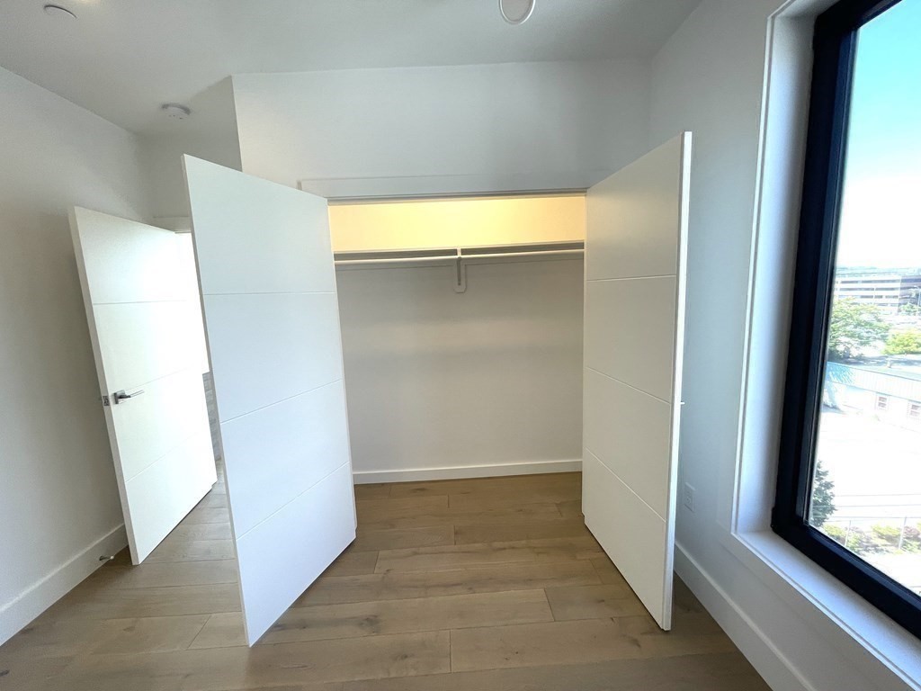 30 Penniman Road, Unit 507 Boston, MA 02134 - Photo 8 of 22 a view of an empty room with a window