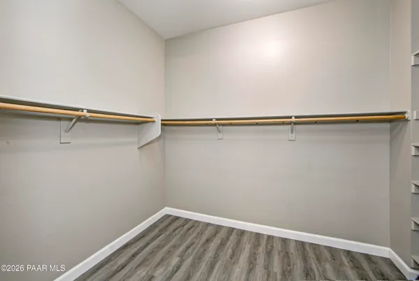 a view of a room with racks on the wall