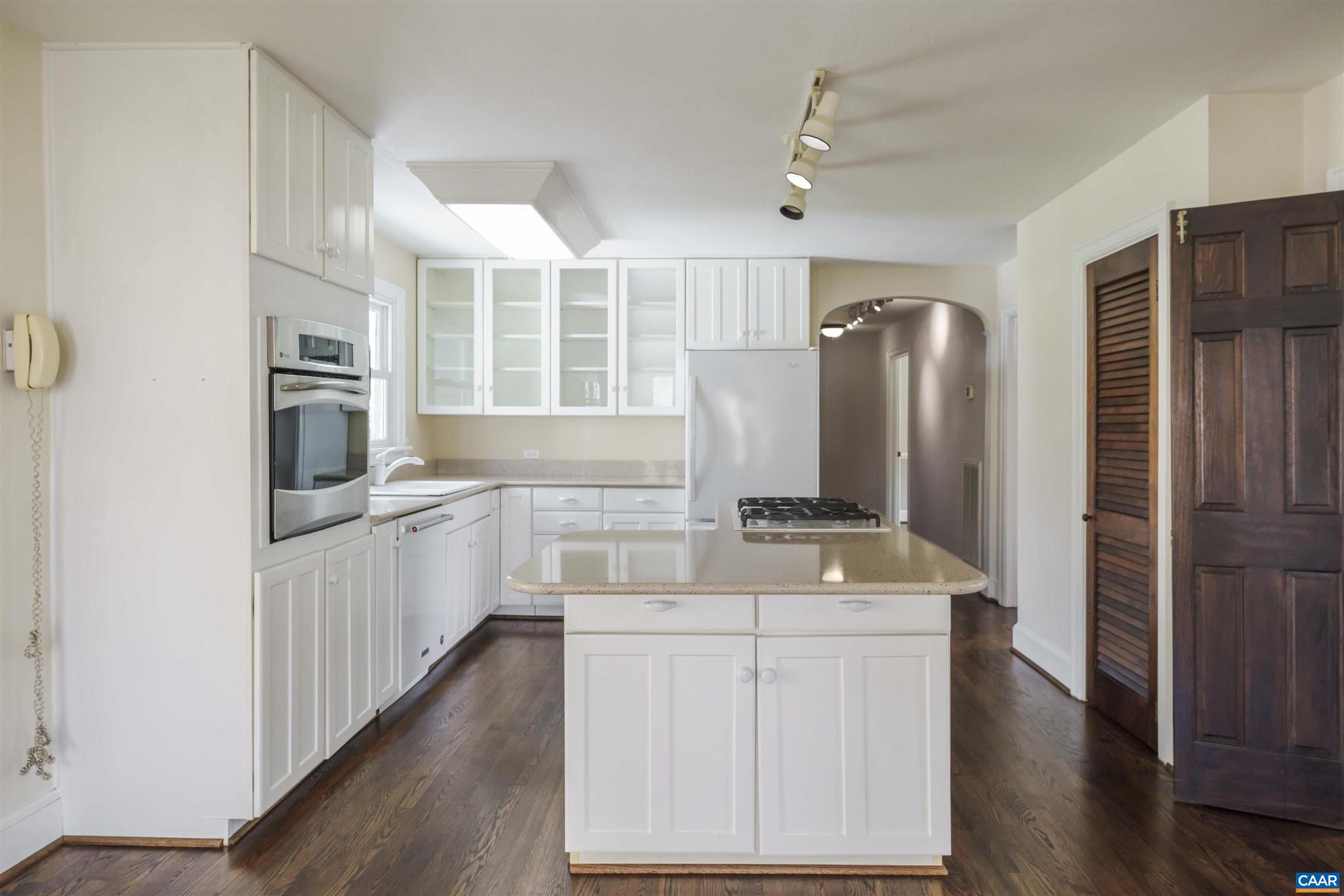 5695 Free Union Road Free Union, VA 22940 - Photo 11 of 68 a kitchen with stainless steel appliances granite countertop a refrigerator a stove and a microwave oven with wooden floor