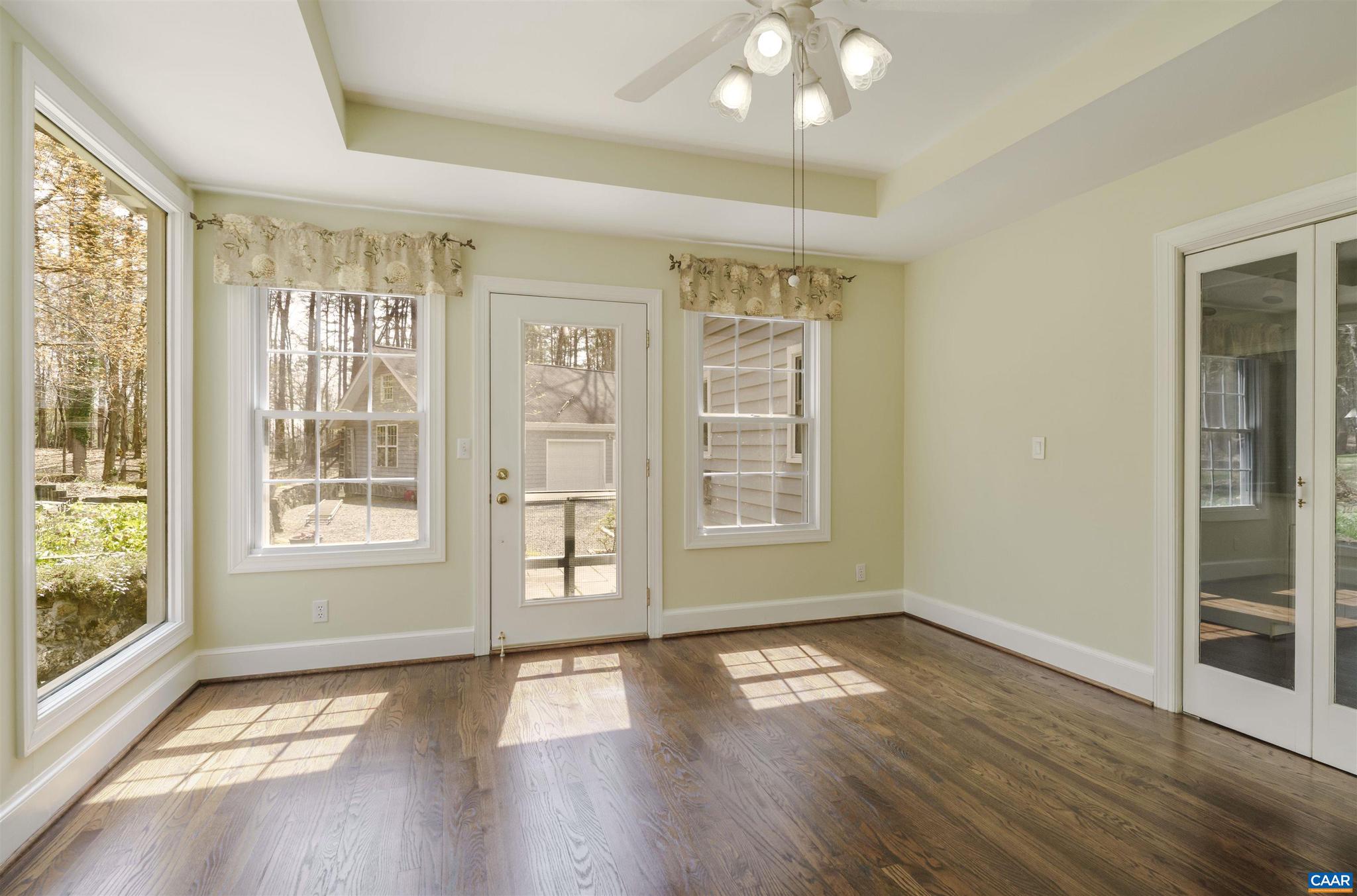 5695 Free Union Road Free Union, VA 22940 - Photo 18 of 68 an empty room with wooden floor and windows