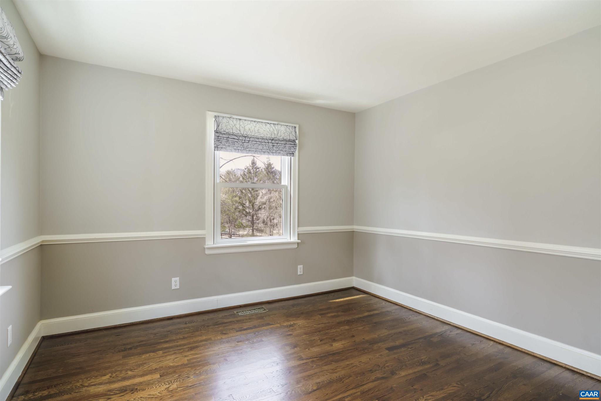 5695 Free Union Road Free Union, VA 22940 - Photo 23 of 68 an empty room with wooden floor and windows