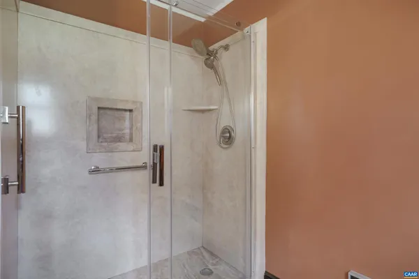 a bathroom with a sink a vanity and a mirror