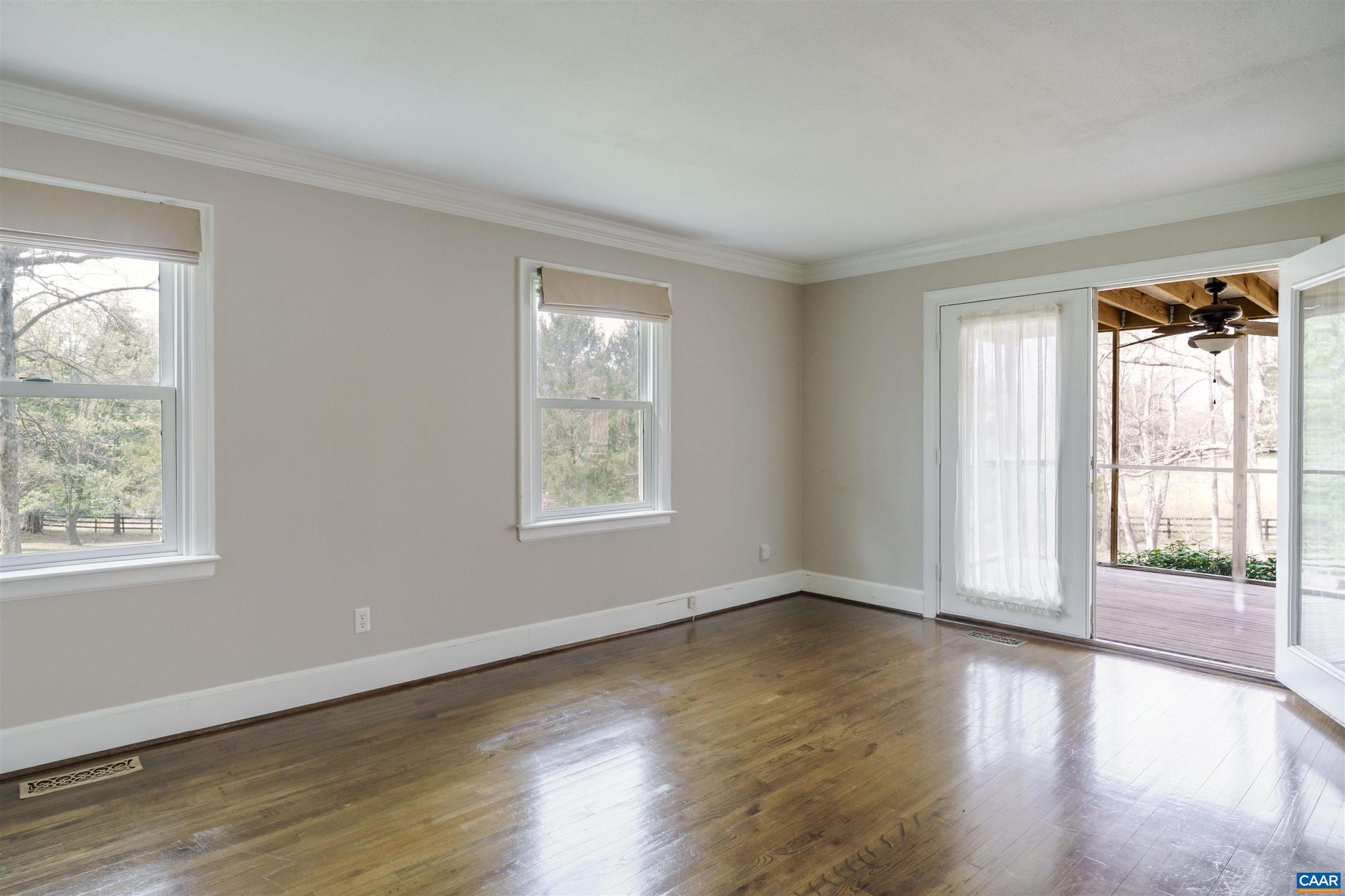 5695 Free Union Road Free Union, VA 22940 - Photo 38 of 68 a view of an empty room with wooden floor and a window