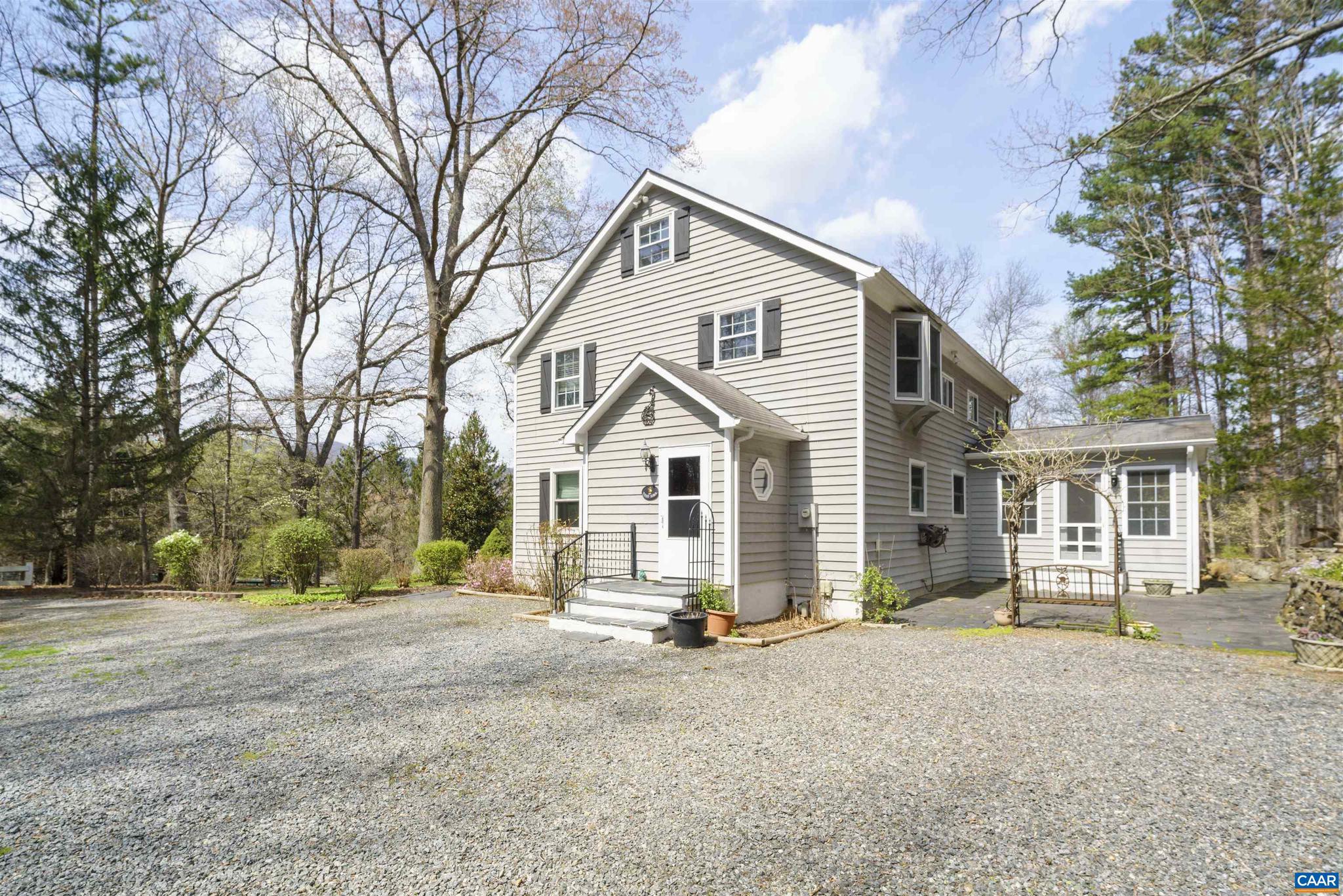 5695 Free Union Road Free Union, VA 22940 - Photo 67 of 68 a view of a house with a yard covered in snow