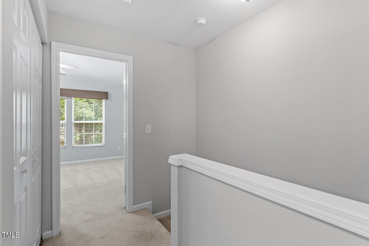 8510 Mt Valley Lane Raleigh, NC 27613 - Photo 20 of 30 a view of a hallway with closet