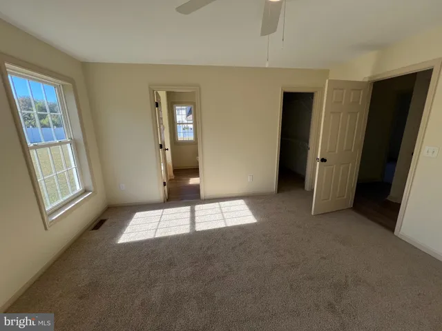 a view of an empty room and window