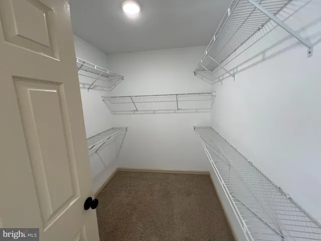 a view of a walk in closet