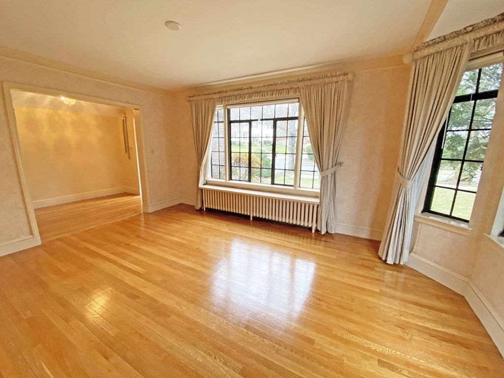 3 Exmoor Road Newton, MA 02459 - Photo 11 of 41 a view of empty room with wooden floor and fan