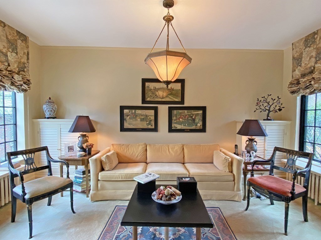 3 Exmoor Road Newton, MA 02459 - Photo 20 of 41 a living room with furniture and a chandelier