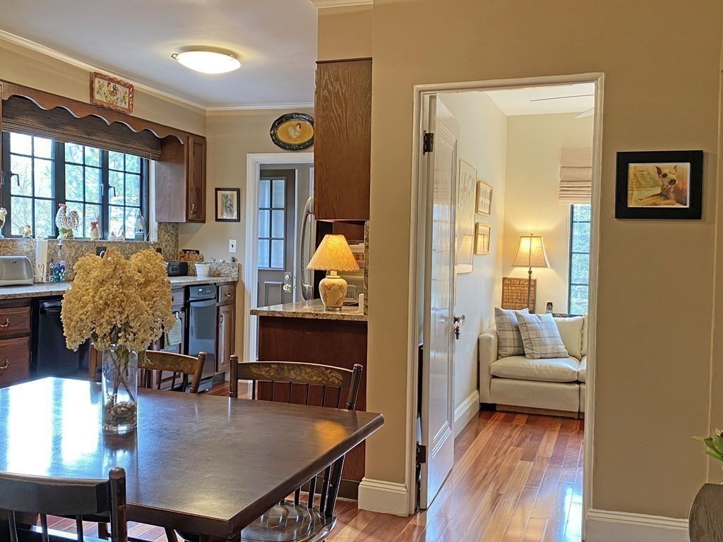 3 Exmoor Road Newton, MA 02459 - Photo 24 of 41 a view of a dining room with furniture and wooden floor