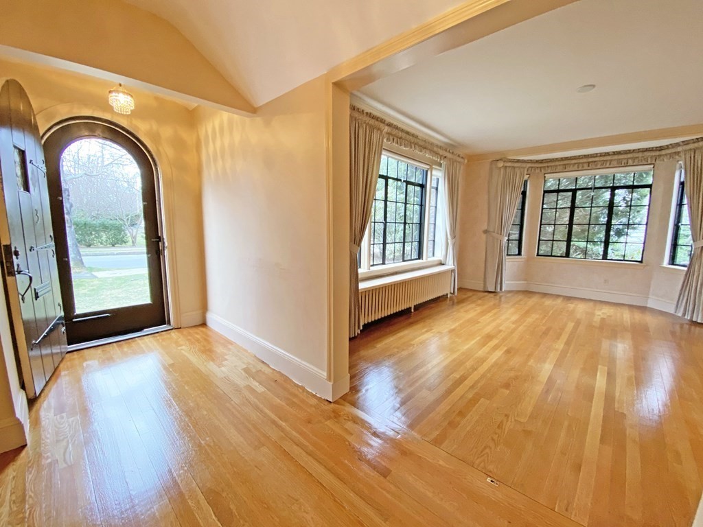3 Exmoor Road Newton, MA 02459 - Photo 7 of 41 a view of a room with wooden floor and windows