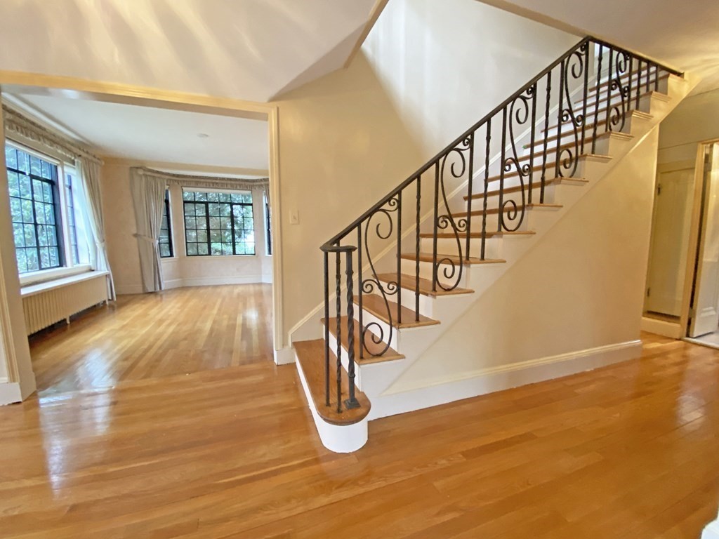 3 Exmoor Road Newton, MA 02459 - Photo 8 of 41 a view of entryway and hall with wooden floor