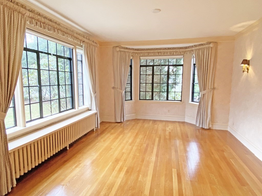 3 Exmoor Road Newton, MA 02459 - Photo 9 of 41 a view of an empty room with a window