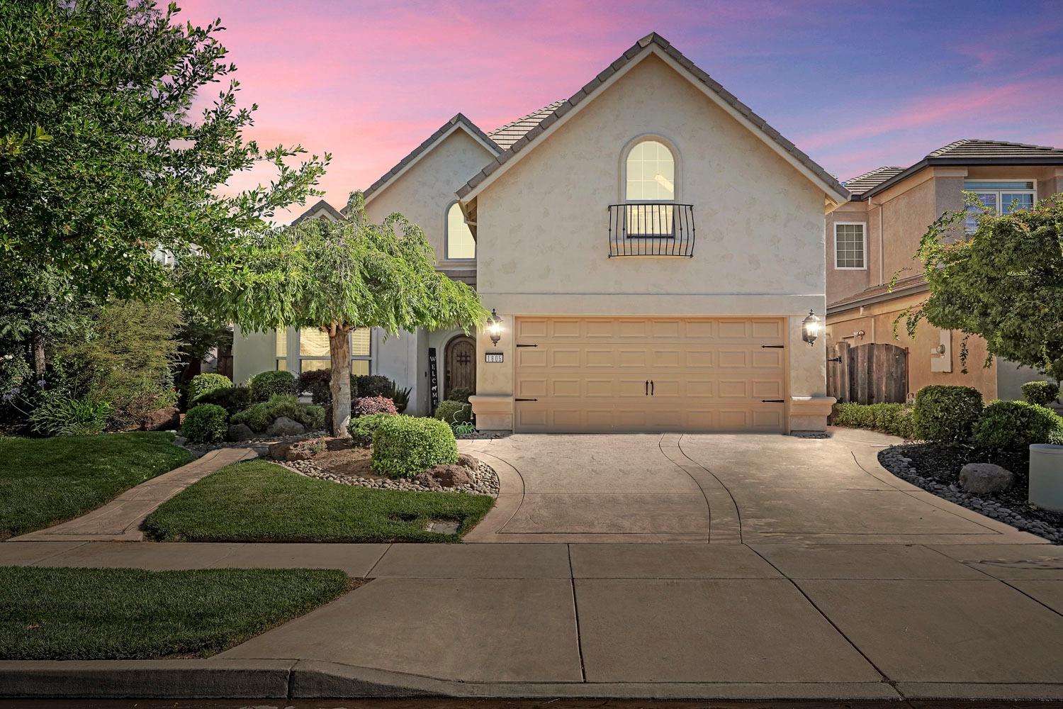 1605 Magic Lane Lodi, CA 95242 - Photo 1 of 1 a front view of a house with garden