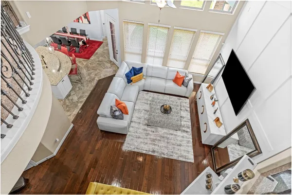 a view of living room with furniture and flat screen tv