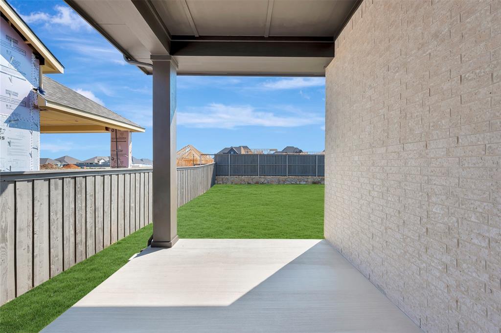 3575 Redbud Flower Trail Venus, TX 76084 - Photo 2 of 36 Fenced backyard featuring a patio