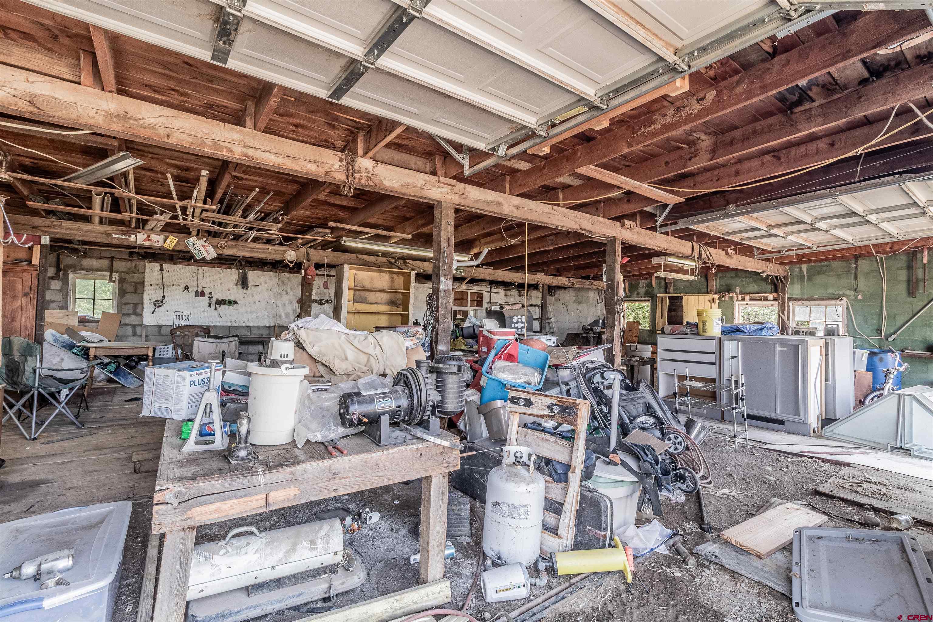 16923 Highway 550 Aztec, NM 87410 - Photo 41 of 45 a view of a storage room with racks