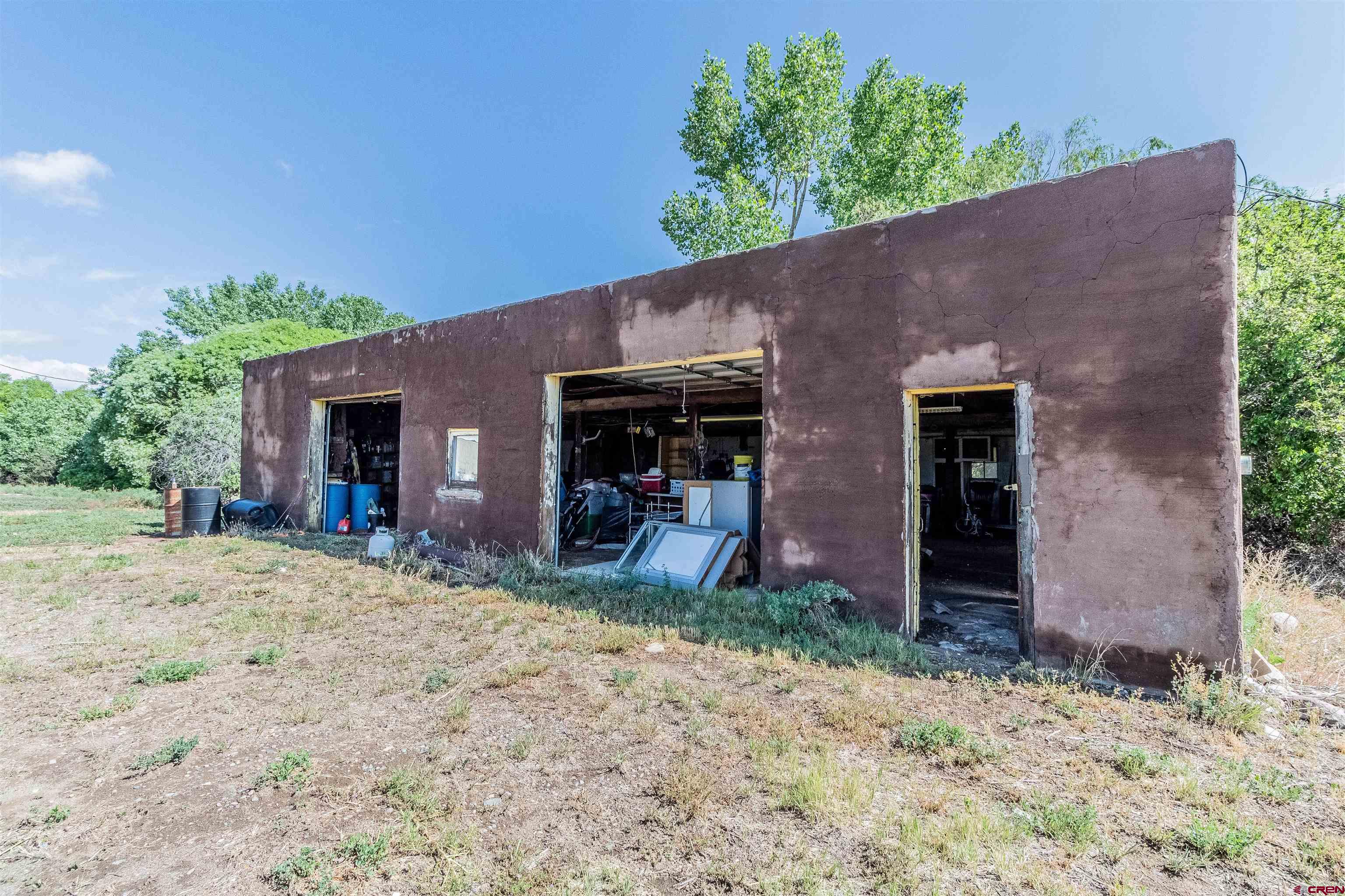 16923 Highway 550 Aztec, NM 87410 - Photo 42 of 45 a view of a house with a patio