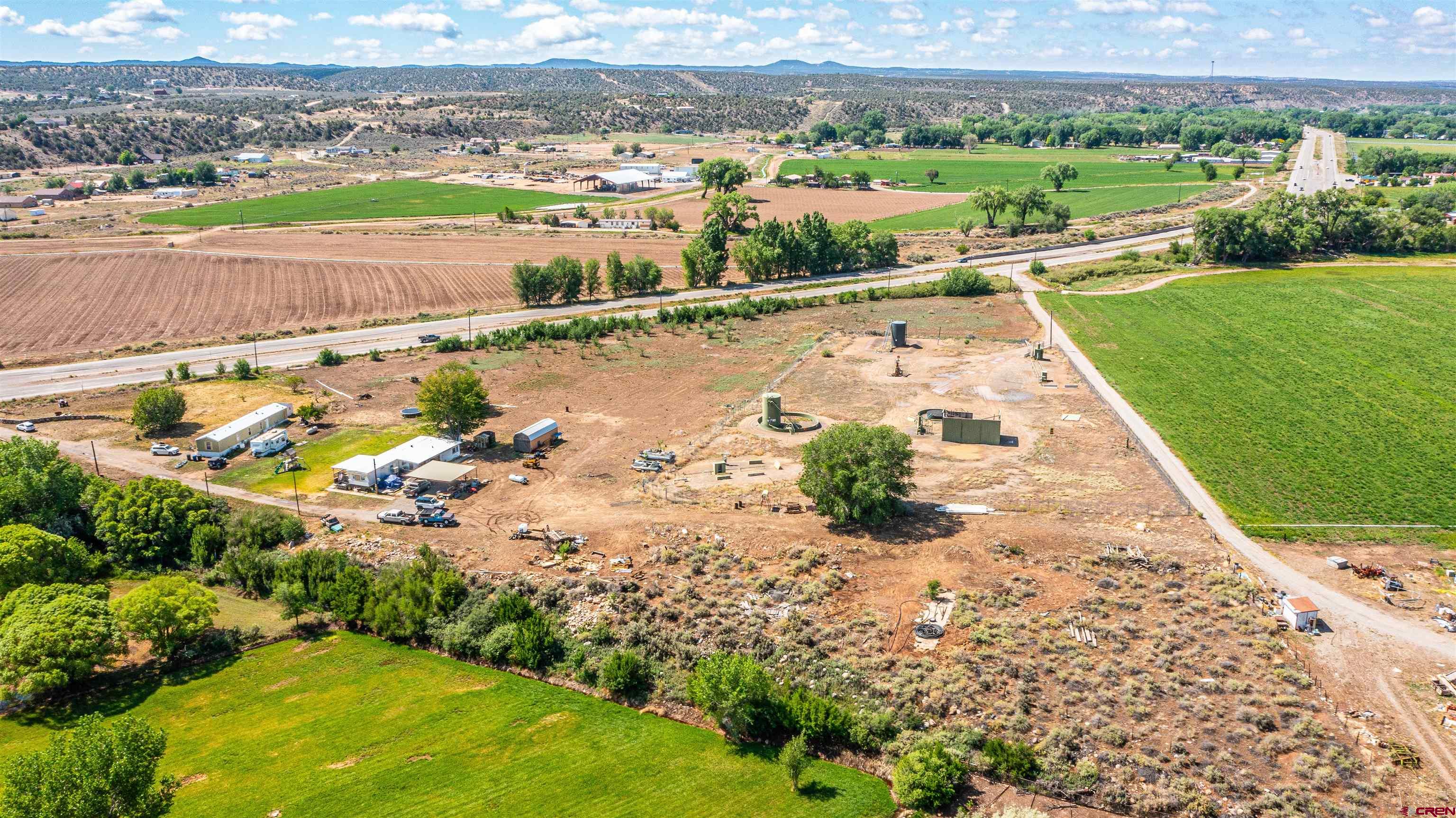 16923 Highway 550 Aztec, NM 87410 - Photo 5 of 45 an aerial view of a city