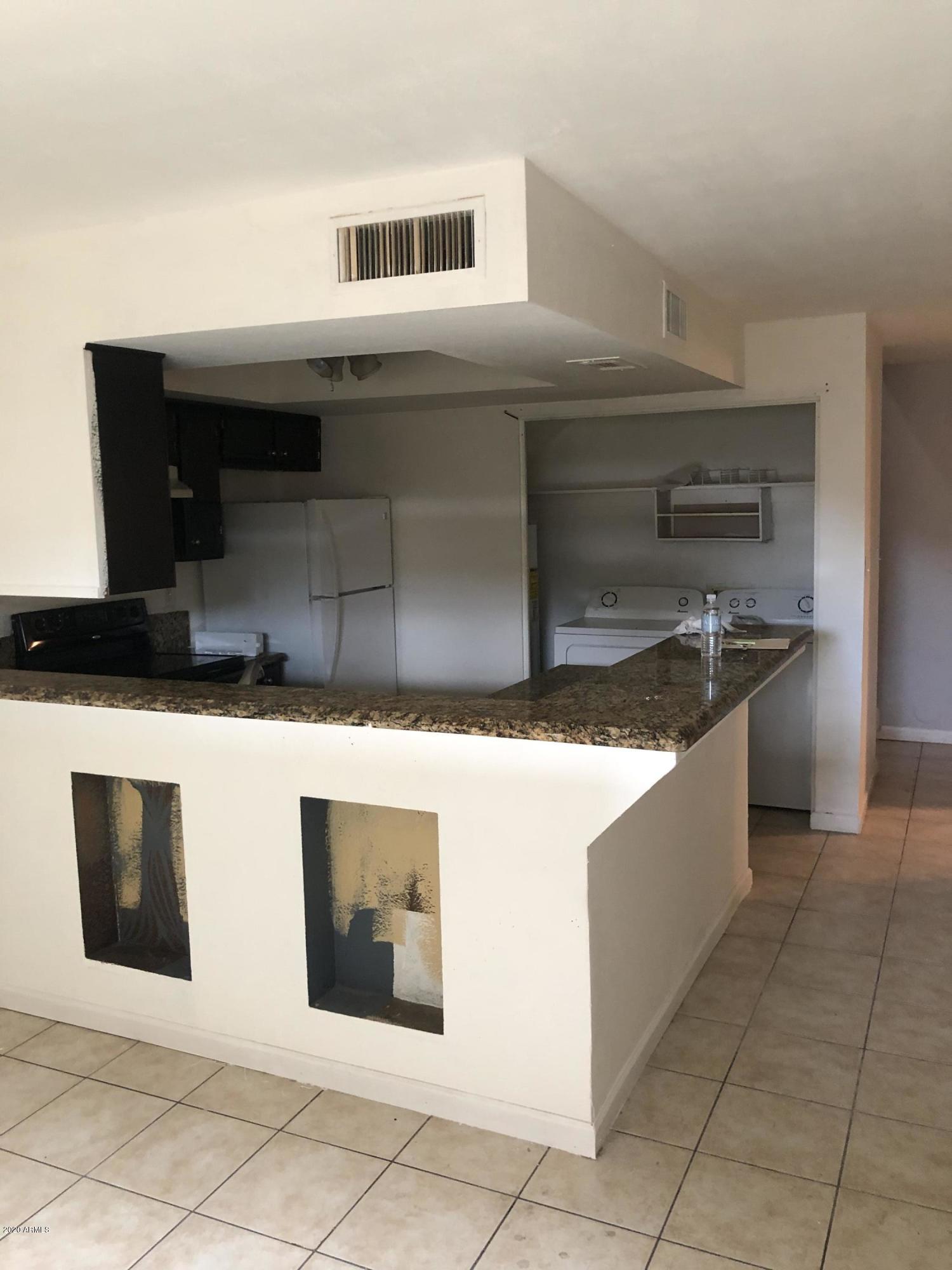 2021 East Osborn Road, Unit 8 Phoenix, AZ 85016 - Photo 3 of 14 IMG_1229