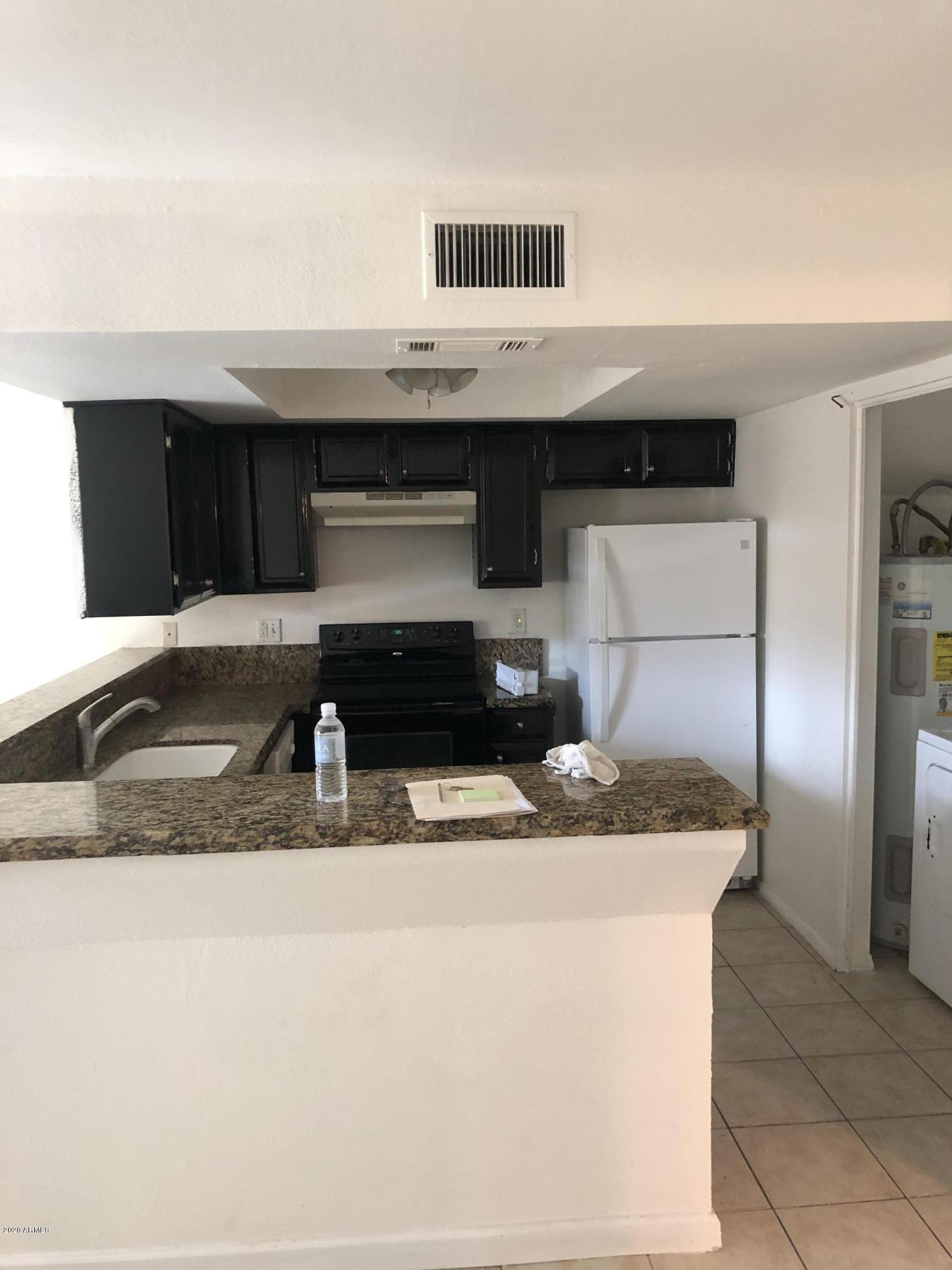 2021 East Osborn Road, Unit 8 Phoenix, AZ 85016 - Photo 4 of 14 IMG_1226