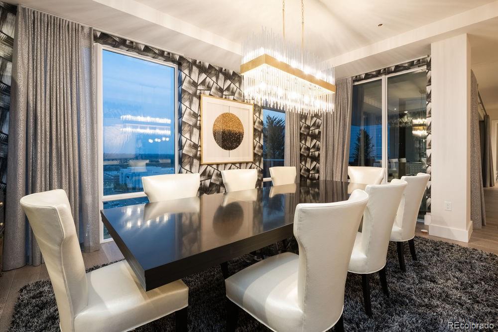 155 Steele Street, Unit 1117 Denver, CO 80206 - Photo 14 of 40 a living room with furniture and a mirror