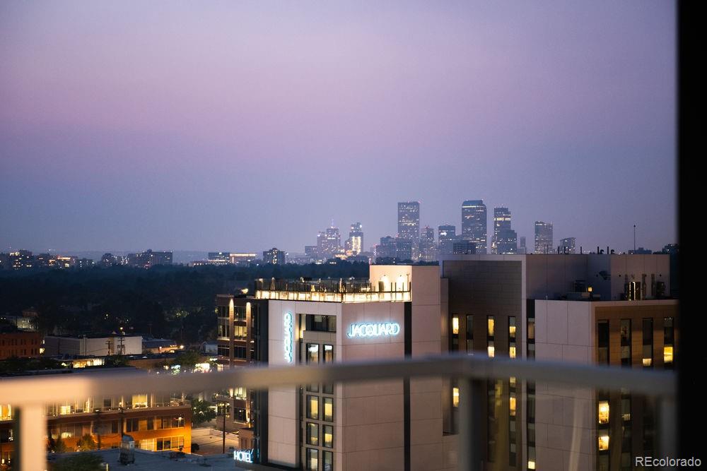 155 Steele Street, Unit 1117 Denver, CO 80206 - Photo 16 of 40 a city view with tall buildings
