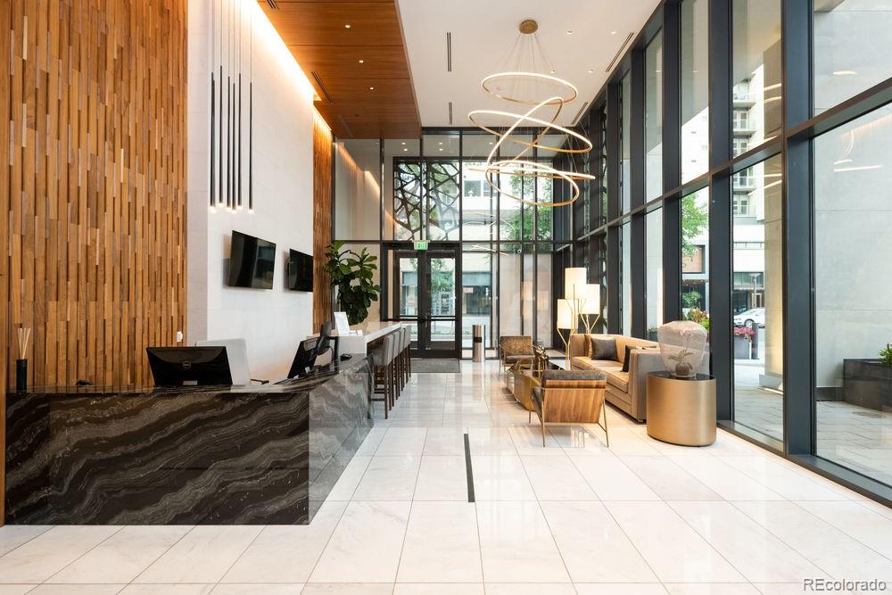 155 Steele Street, Unit 1117 Denver, CO 80206 - Photo 40 of 40 a living room with furniture