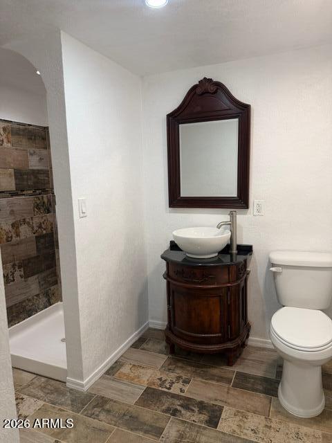 1129 11th Street Douglas, AZ 85607 - Photo 11 of 13 a living room with a toilet and a rug