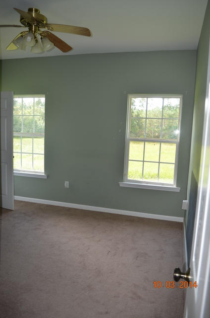 5965 Buckward Road Baker, FL 32531 - Photo 13 of 27 a view of an empty room with a window