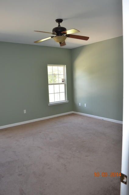 5965 Buckward Road Baker, FL 32531 - Photo 25 of 27 an empty room with a window and a fan