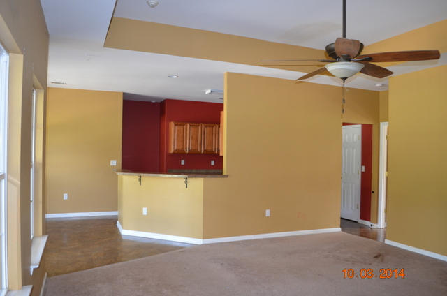 5965 Buckward Road Baker, FL 32531 - Photo 9 of 27 a view of a livingroom with a chandelier fan