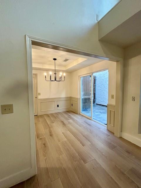 17119 Upper Bay Road Addison, TX 75001 - Photo 10 of 29 a view of empty room with wooden floor and fan