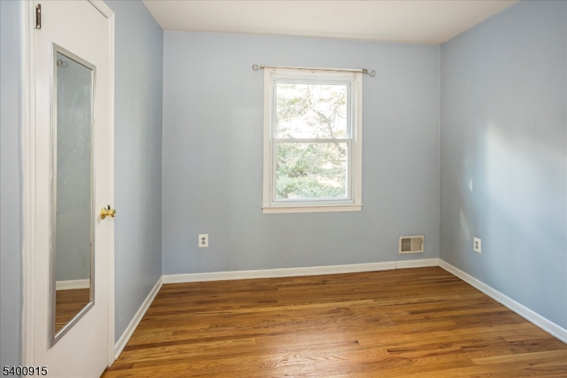 2 Bernard Court Lebanon, NJ 08833 - Photo 24 of 37 a view of a room with wooden floor and windows