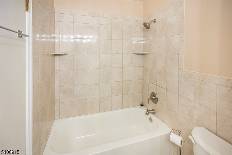 2 Bernard Court Lebanon, NJ 08833 - Photo 26 of 37 a bathroom with a shower and a bath tub