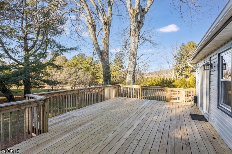 2 Bernard Court Lebanon, NJ 08833 - Photo 27 of 37 a view of balcony with wooden floor and outdoor seating